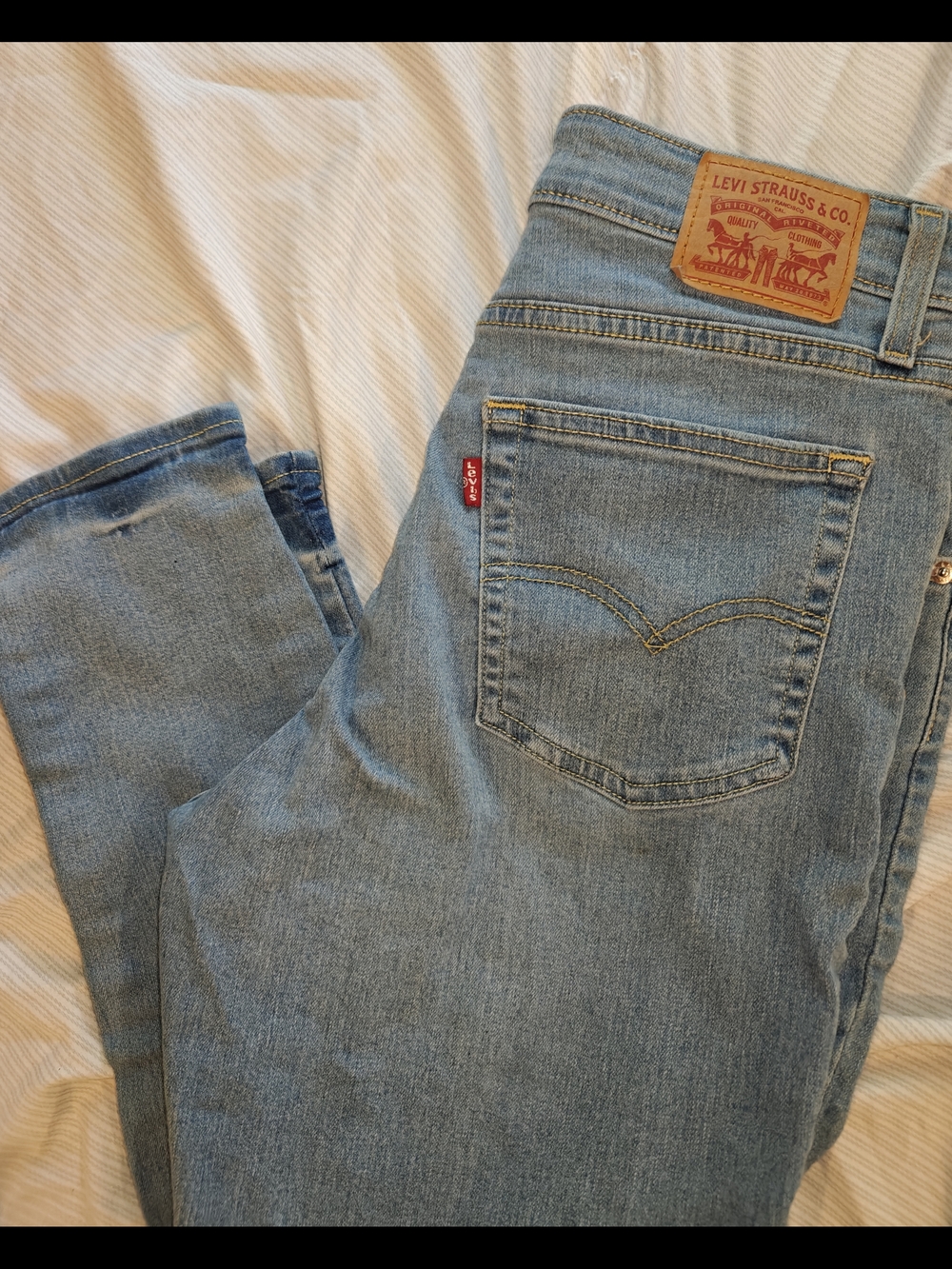 Levi's Light Blue Denim Jeans with Signature Red Tab